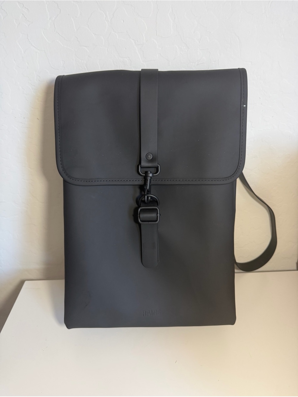 RAINS Black Waterproof MSN Bag Backpack Matte Finish Carabiner Clasp Unisex